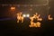 Unfocused night shot of Christmas reindeers and garland lights bokeh in the city. Happy New Year, Merry Christmas