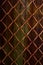 Unfocused rusty mesh texture background. Stock photo of a rusty mesh