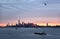 Unfocused silhouette sunrise panorama of New York.