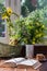 unfolded book and eyeglasses lie on a wooden table on terrace. Meadow Flowers in vase add coziness