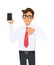 Unhappy business man showing new brand, latest smartphone. Man holding cell, mobile phone in hand and making thumbs down.