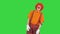 Unhappy clown standing and being nervous on a Green Screen, Chroma Key.