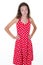 Unhappy dissatisfied young woman in red summer dress standing teen girl feels disappointed isolated over white background