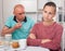 Unhappy family couple discussion while quarrel in home interior