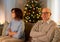 unhappy senior couple at home on christmas