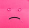 Unhappy sticky note. Pink paper