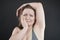 Unhappy woman shows her unshaved armpit. plus size middle age woman is not happy with hair in her armpits. Caucasian girl is