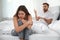 Unhappy young couple quarreling at home. Relationships