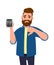 Unhappy young man showing or holding a digital calculator device in hand and gesturing, making thumbs down sign. Bad, dislike.