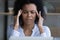 Unhealthy African American woman struggle with migraine