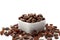 Unhealthy snacks and cacao based sweets concept smooth shine chocolate covered raisins in ceramic bowl isolated on white