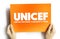 UNICEF is an agency responsible for providing humanitarian and developmental aid to children worldwide, text concept on card for