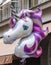 A unicorn balloon in white and pink colors