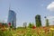 Unicredit Tower and Bosco Verticale seen from the Biblioteca degli Alberi BAM. Milan. Italy. Flowering fields