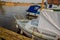 Unidentifiable boats moored on the River Yare, Norfolk Broads, Acle