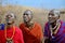 Unidentified African people from Masai tribe prepare to show