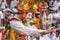 Unidentified balinese people performing in traditional masks during Galungan celebration in Ubud, Bali