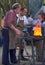 Unidentified Blacksmiths working on metal at forge in the moder