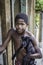 Unidentified boy wit a dog in Favela (slums) in Rio de Janeiro.