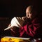 Unidentified Buddhist lama play music near stupa Boudhanath