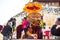 Unidentified Buddhist pilgrims near stupa Boudhanath during festive solemn Puja