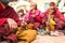 Unidentified Buddhist pilgrims near stupa Boudhanath during festive solemn Puja
