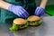 Unidentified chef preparing veggie burgers with yummy vegetable