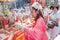 An unidentified devotee of a Chinese shrine blesses people on t