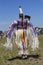 Unidentified female Native American dancer wears traditional Pow Wow dress during the NYC Pow Wow