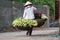 Unidentified flower vendor at the flower small market