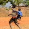 Unidentified Ghanaian the boys run in a local village.