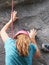 Unidentified girl climbing the wall