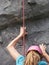 Unidentified girl climbing the wall