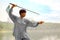 Unidentified group of people practice Chinese sword with Tai Chi Chuan in a park