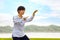 Unidentified group of people practice Tai Chi Chuan in a park