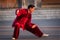 Unidentified group of people practicing Tai Chi at Zhonglou Bell Tower in Beijing, China