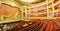 Unidentified group of tourists visit the interior of Opera de Paris