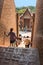 An unidentified groups of tourists and travelers in Wat Yai Chai Mongkol temple in Ayutthaya Thailand