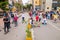 Unidentified hispanic pedestrians, skateboarders