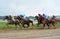 Unidentified horses and jockeys galloping in race at the Belgrade Hippodrome on Jun 19, 2016 in Belgrade, Serbia