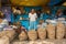 Unidentified indian seller selling ginger and garlic in Calcutta, West Bengal, India