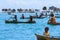 Unidentified local BAJAU LAUT people on wooden boat in Bodgaya Island in Tun Sakaran marine park, Sabah Borneo, Malaysia