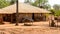 Unidentified local boy rides a bicycle in a village in Guinea B