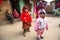 Unidentified local children near their homes in a poor area of the city