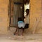 Unidentified local litle girl takes on shoe in the Etigoca vill