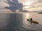 Unidentified man on sea Kayaker Aerial View during sunset.