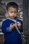 Unidentified Newari Nepalese child playing in Bhaktapur, Nepal, listed as a World Heritage by UNESCO for its rich culture