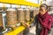 Unidentified old woman near stupa Boudhanath. Stupa is one of the largest in the world