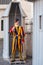 Unidentified Papal Swiss guard standing with a halberd circa