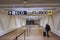 Unidentified passenger walks to the boarding gates in airport